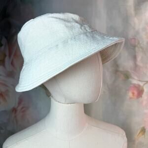 Everybody.World Cream Bucket Hat